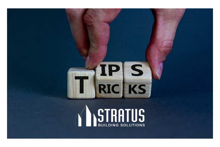 Three cubes, the first with the letter T and the next two poised to convey TIPS and TRICKS.