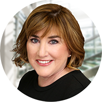 Maureen DiStefano with a Clean Office in the Background